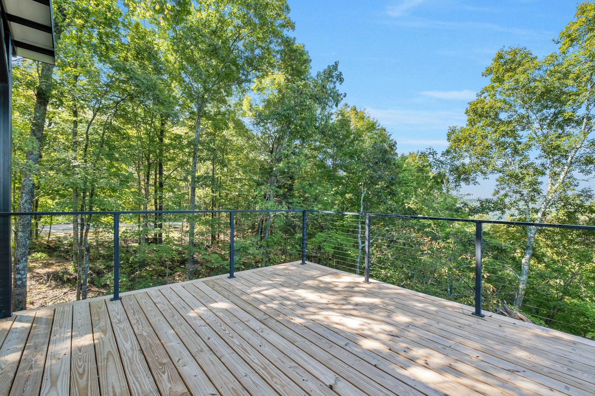 0 Wet Mill Creek Road Celina, TN 38551 - Photo 19 of 42 a view of a balcony with wooden floor