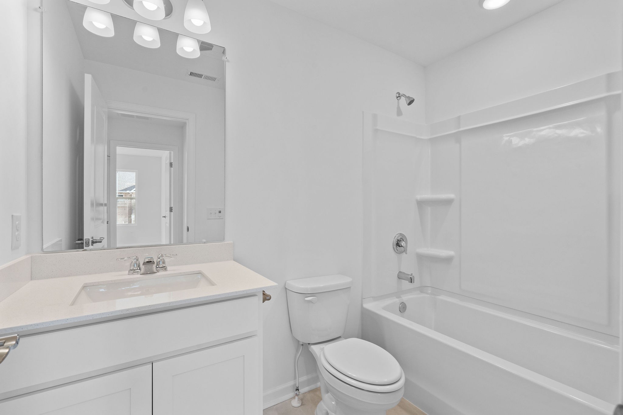 7124 Mapleside Lane Fairview, TN 37062 - Photo 17 of 30 a bathroom with a sink toilet and shower