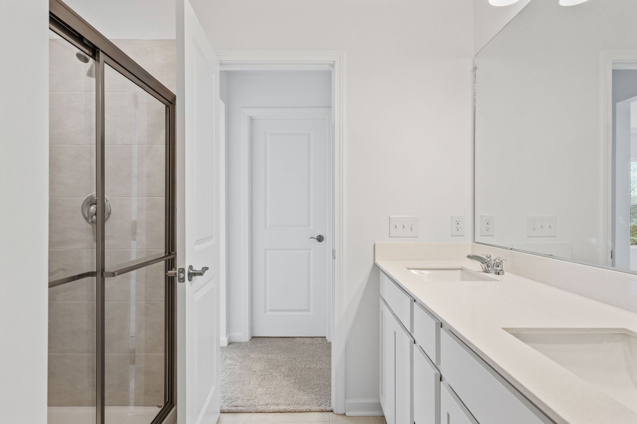 7124 Mapleside Lane Fairview, TN 37062 - Photo 24 of 30 a bathroom with a sink and a mirror