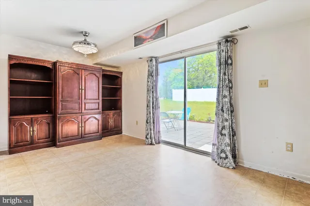 a kitchen with stainless steel appliances a stove sink and refrigerator