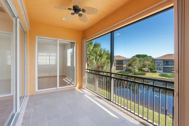 a view of balcony with furniture