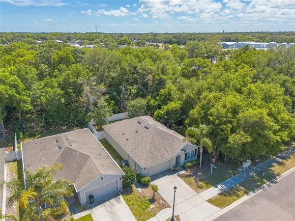 an aerial view of residential building with outdoor space