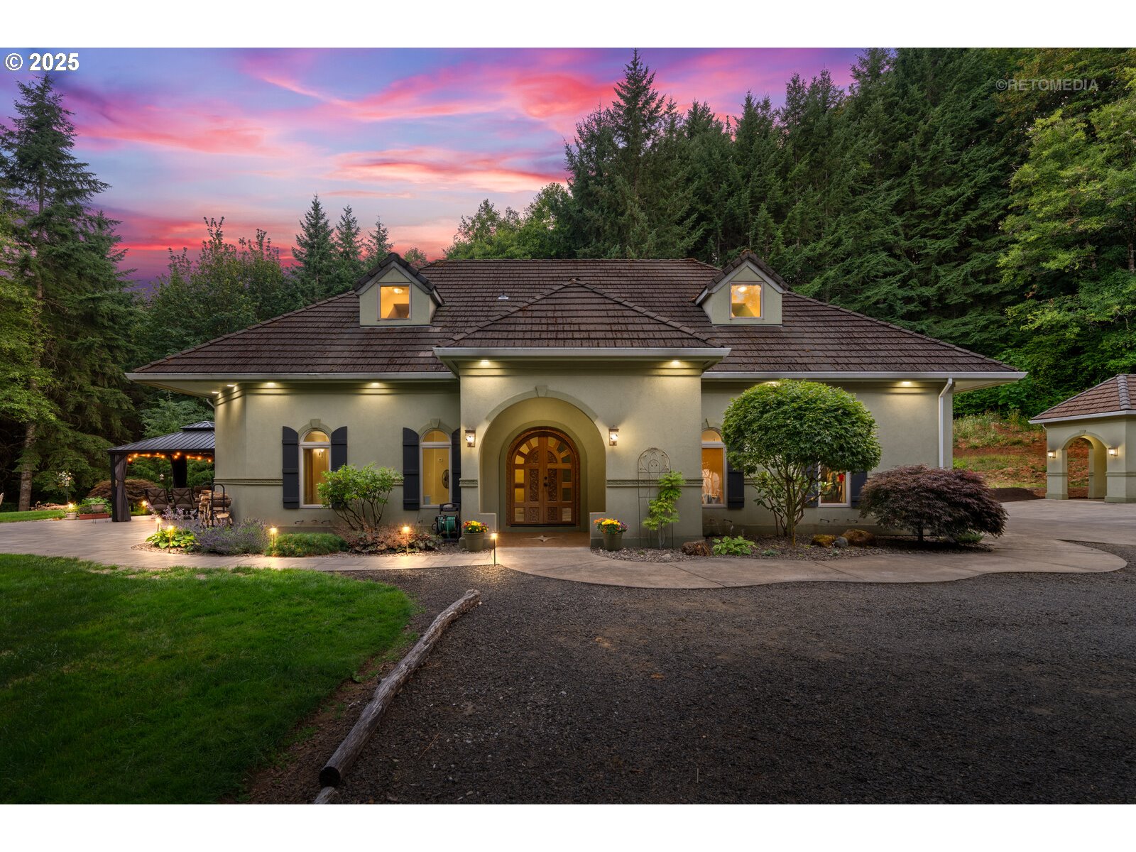 a front view of a house with swing and garden