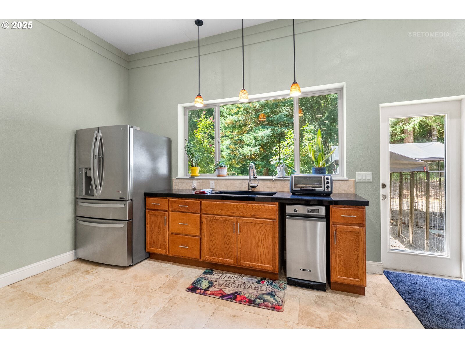 40811 Northwest Linklater Road North Plains, OR 97133 - Photo 14 of 48 a kitchen with granite countertop a refrigerator and a sink