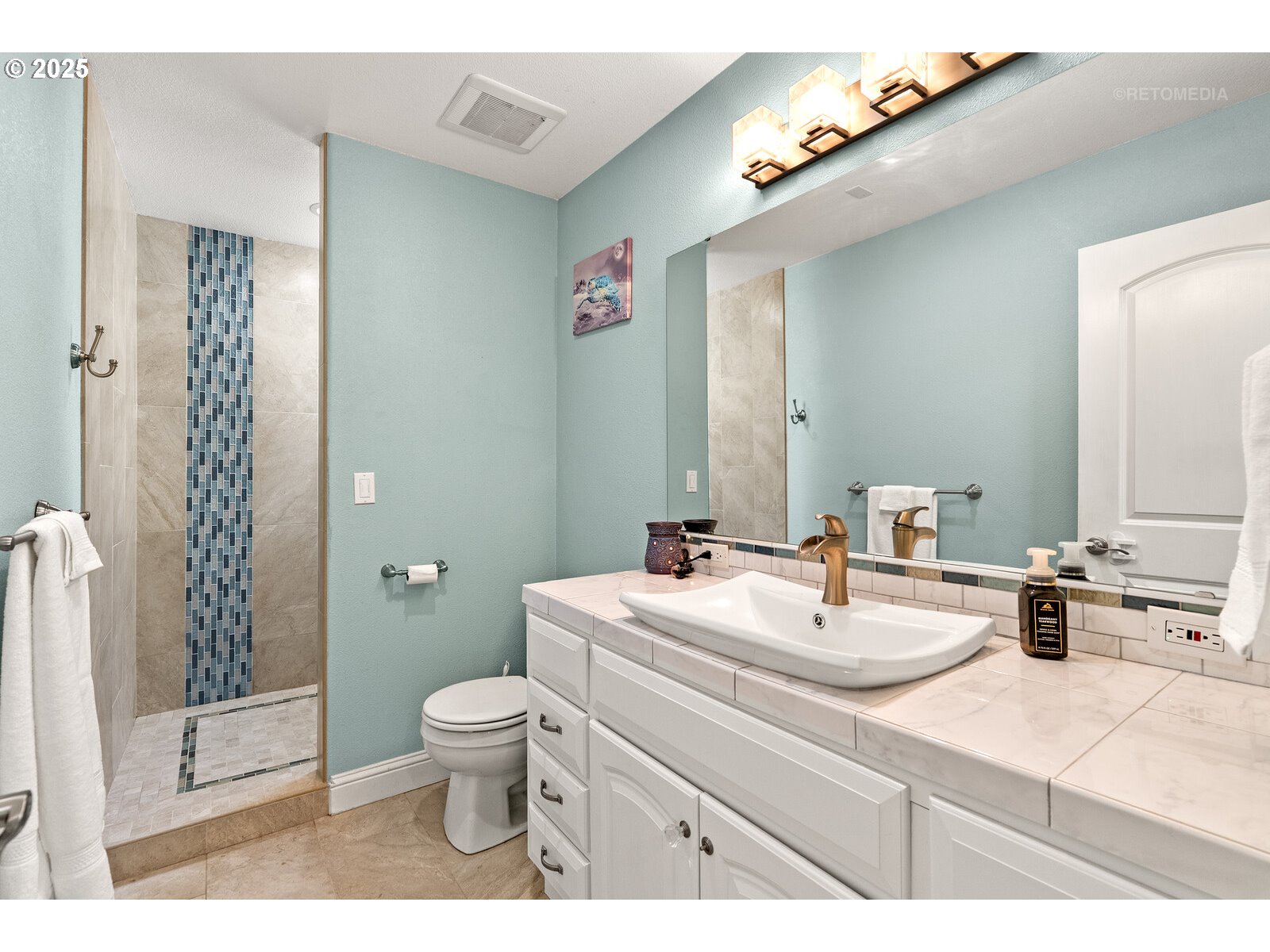 40811 Northwest Linklater Road North Plains, OR 97133 - Photo 29 of 48 a bathroom with a toilet a sink and a mirror