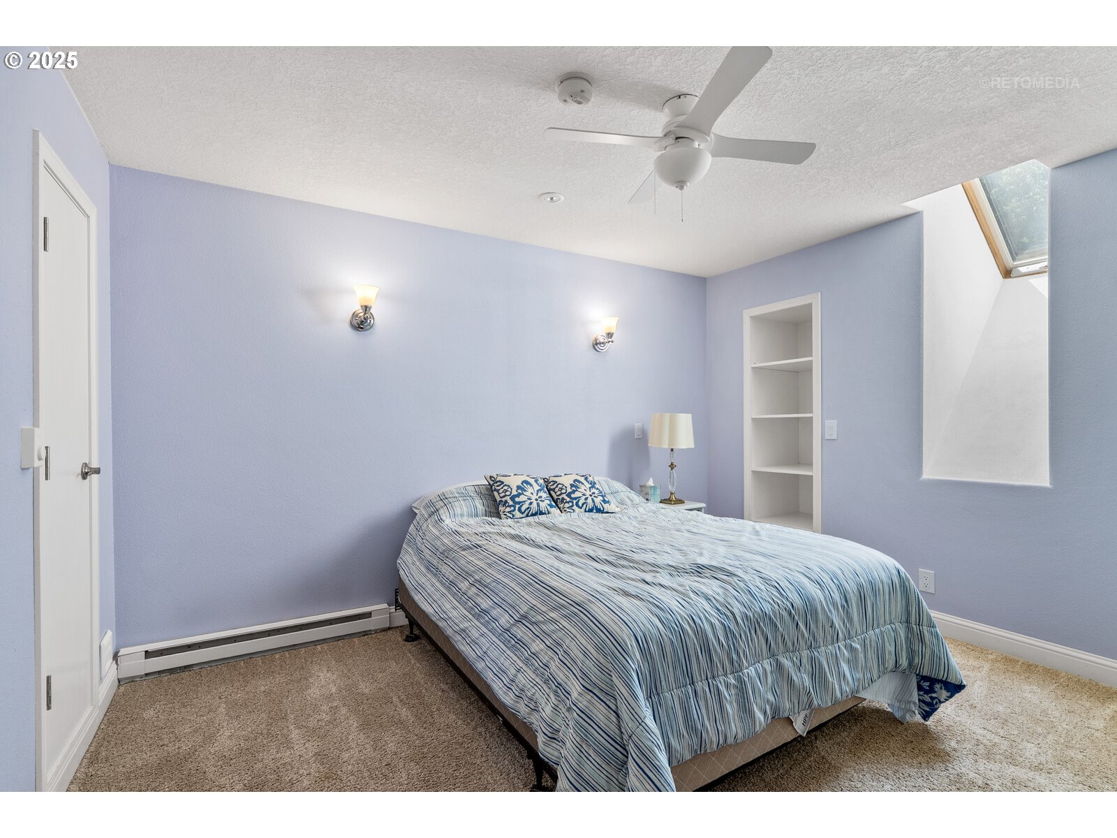 40811 Northwest Linklater Road North Plains, OR 97133 - Photo 30 of 48 a bedroom with a bed and a ceiling fan