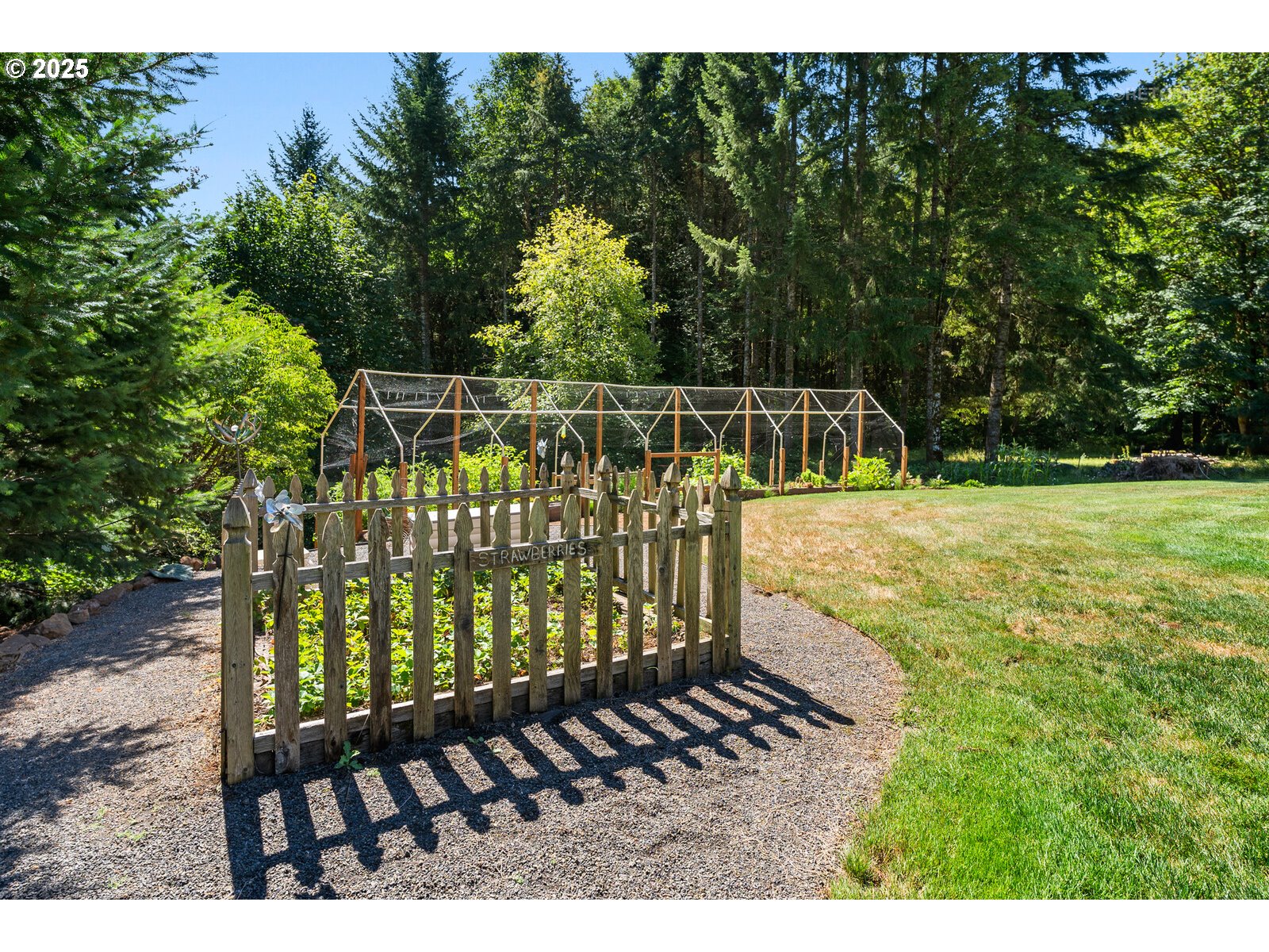 40811 Northwest Linklater Road North Plains, OR 97133 - Photo 32 of 48 a view of a yard with wooden fence