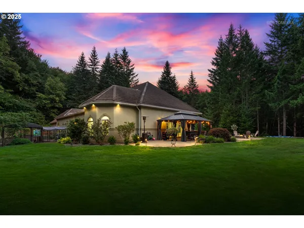 a view of a house with a big yard