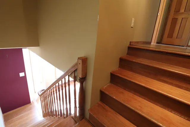 a view of a backyard with sitting area