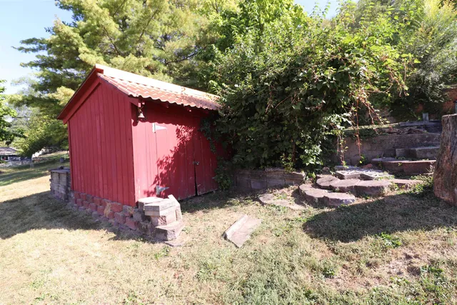 a house with trees in front of it