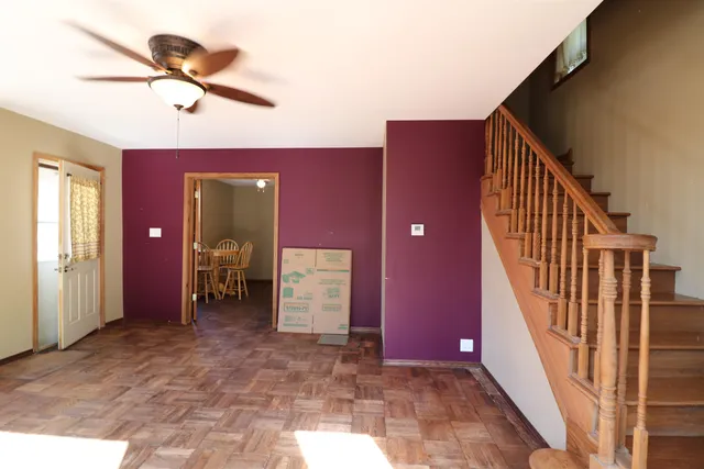 a view of an entryway with a front door
