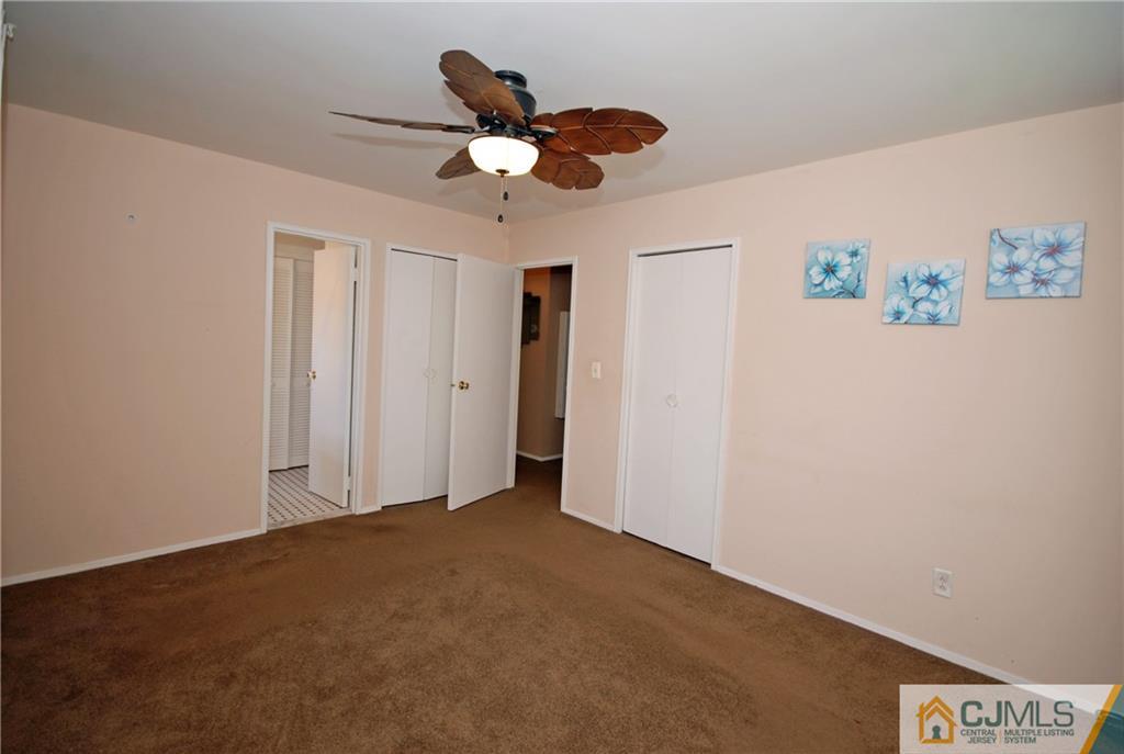 25 Barlow Road Edison, NJ 08817 - Photo 14 of 27 a view of a livingroom with a ceiling fan