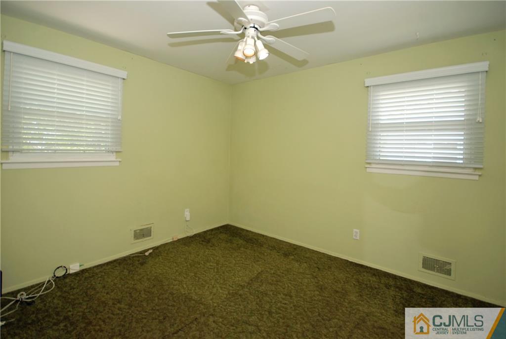 25 Barlow Road Edison, NJ 08817 - Photo 16 of 27 a view of an empty room with a window