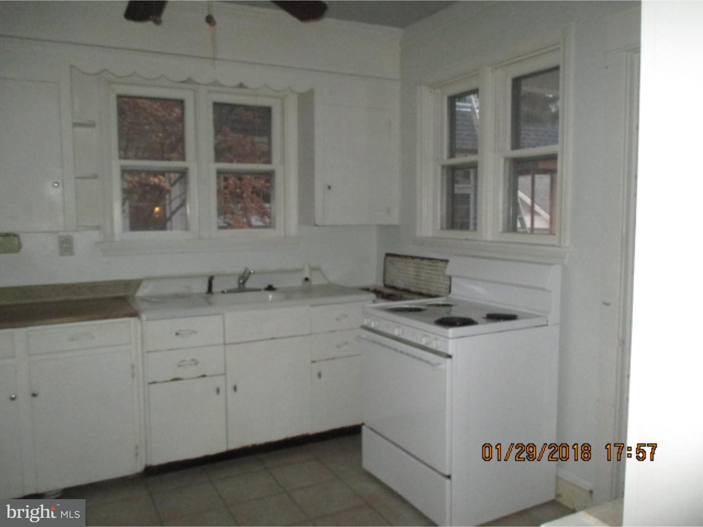 45 Decatur Road Havertown, PA 19083 - Photo 4 of 13 a utility room with cabinets