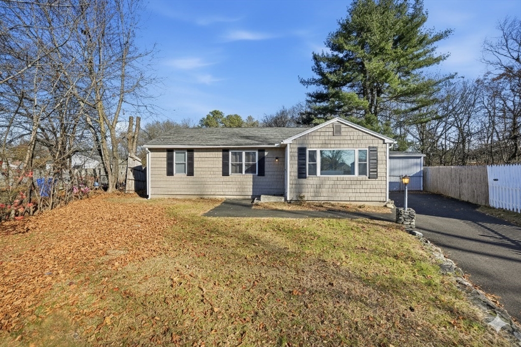 30 Lively Lane Springfield, MA 01109 - Photo 1 of 33 a front view of a house with a garden