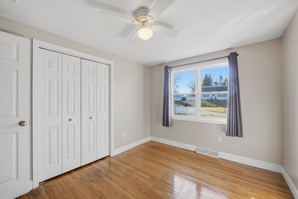 30 Lively Lane Springfield, MA 01109 - Photo 15 of 33 a view of an empty room with window and wooden floor