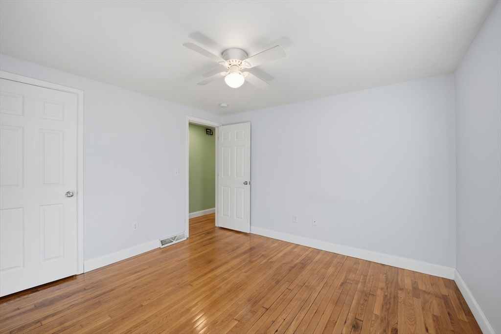 30 Lively Lane Springfield, MA 01109 - Photo 19 of 33 a view of an empty room with wooden floor
