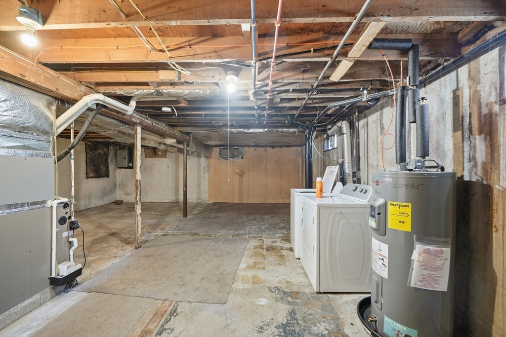 30 Lively Lane Springfield, MA 01109 - Photo 24 of 33 a view of a storage room with washer and dryer