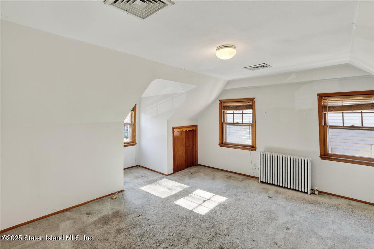 35 Crowell Avenue Staten Island, NY 10314 - Photo 12 of 33 an empty room with windows