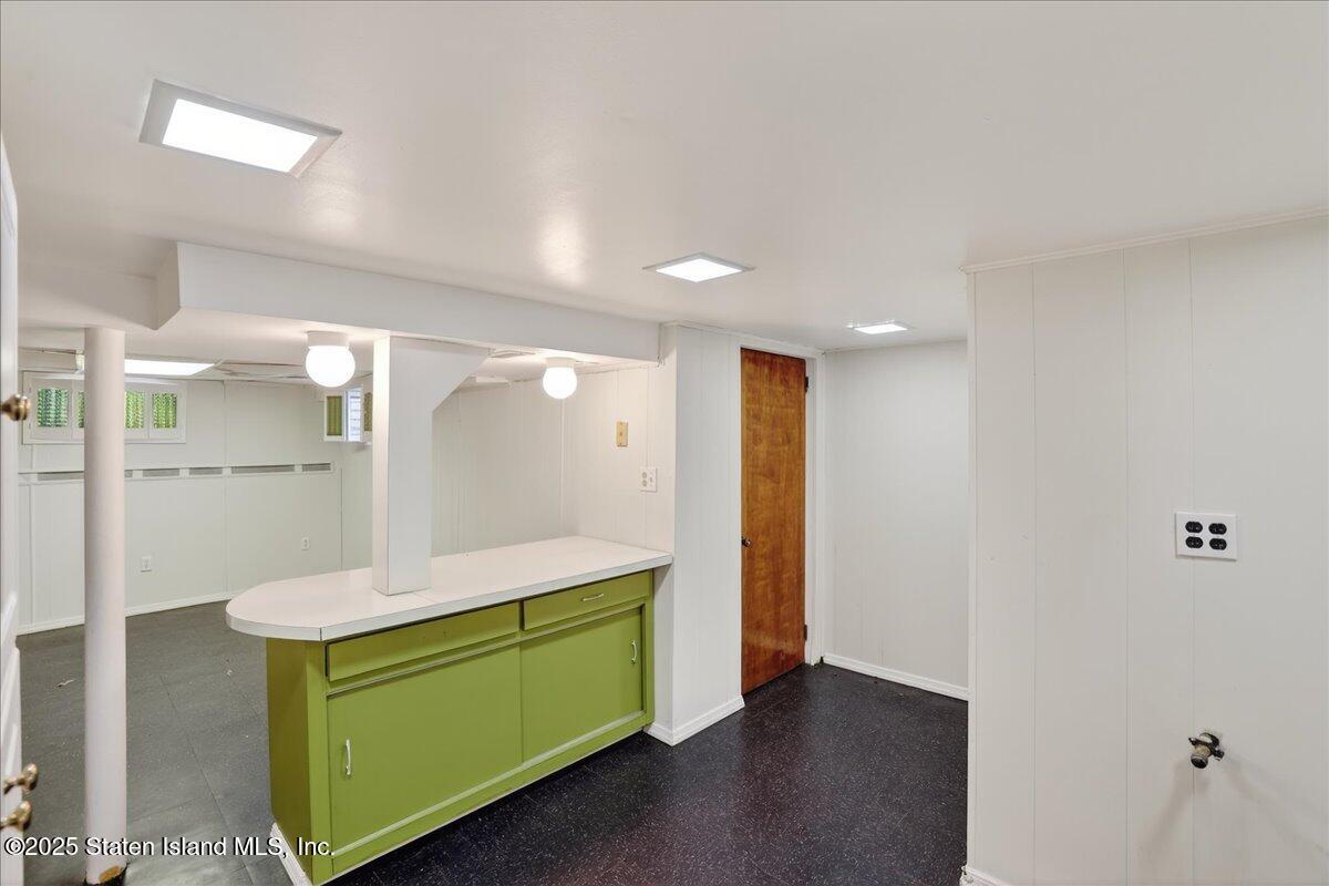 35 Crowell Avenue Staten Island, NY 10314 - Photo 20 of 33 a bathroom with a sink and a mirror