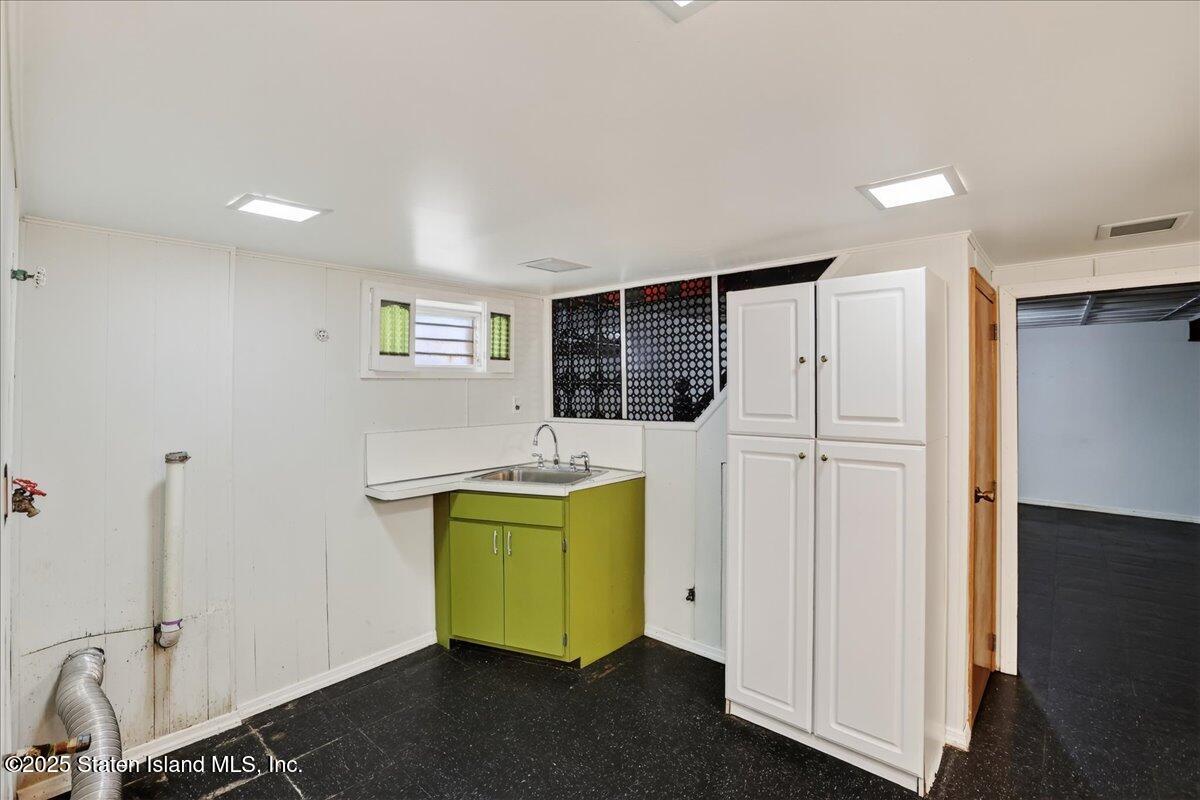35 Crowell Avenue Staten Island, NY 10314 - Photo 21 of 33 a view of a storage & utility room with a window