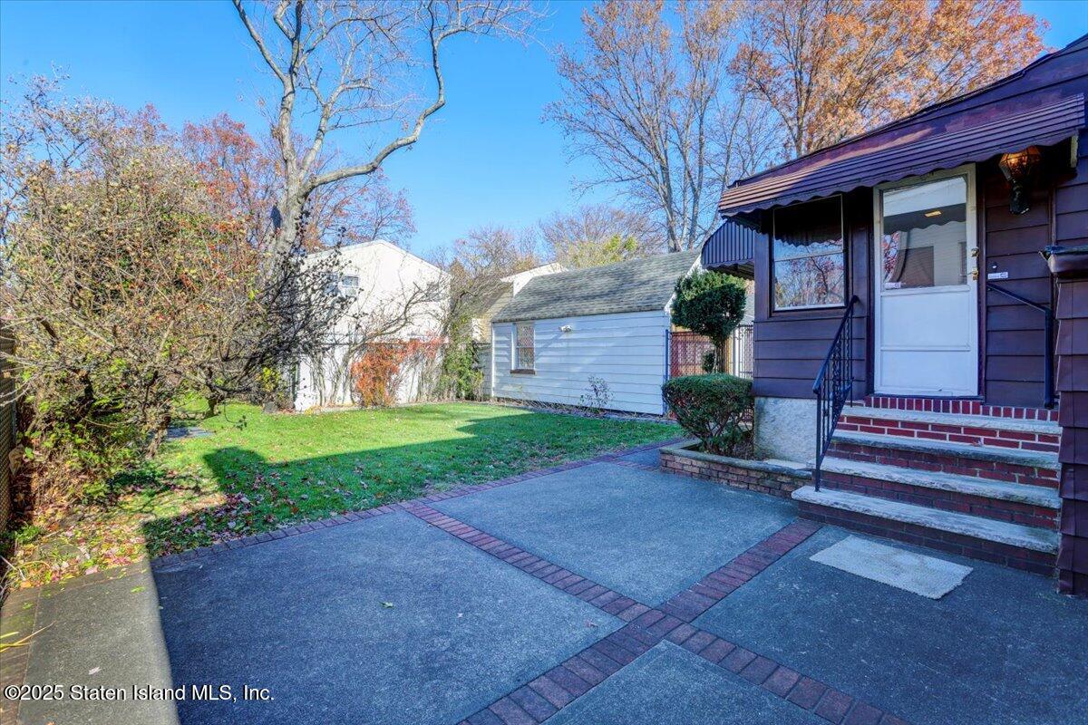 35 Crowell Avenue Staten Island, NY 10314 - Photo 24 of 33 a view of a house with a yard