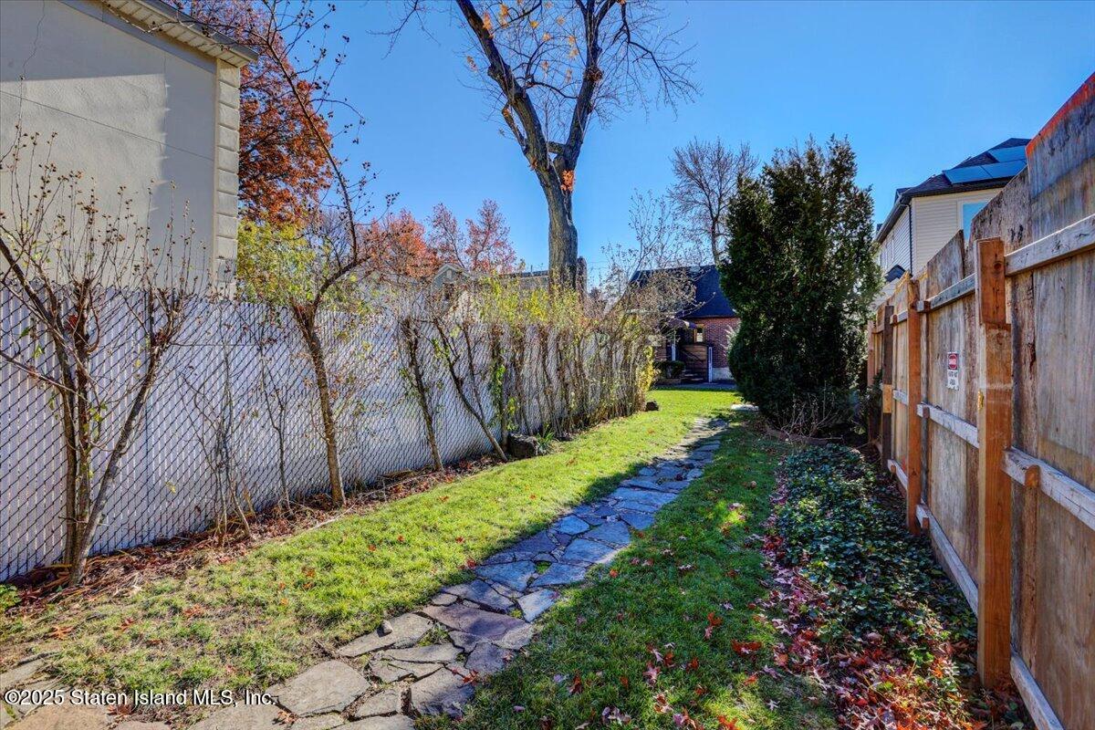 35 Crowell Avenue Staten Island, NY 10314 - Photo 28 of 33 a view of a yard with large trees