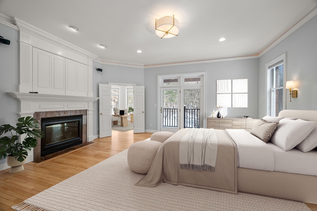 20 Flint Road Concord, MA 01742 - Photo 11 of 34 a bedroom with a bed and a fireplace