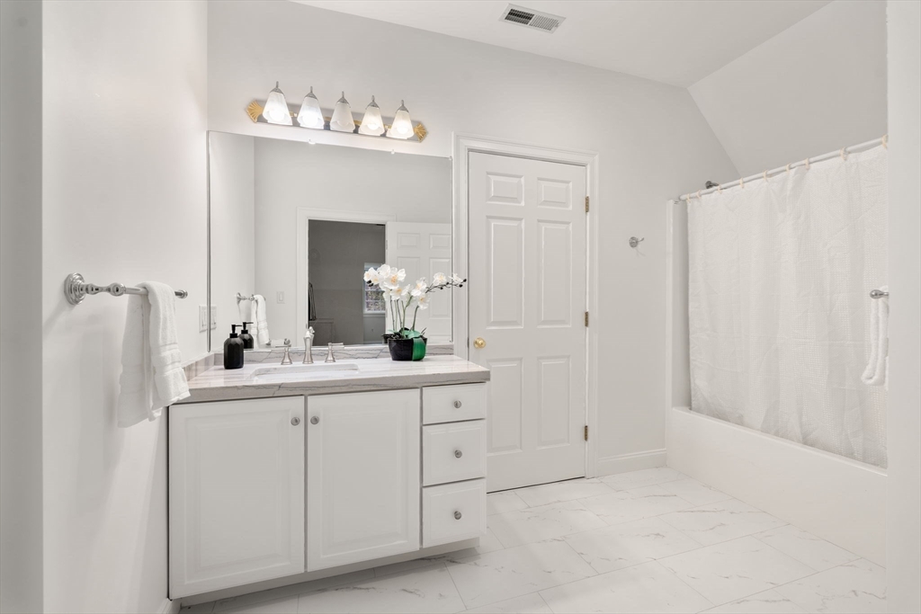 20 Flint Road Concord, MA 01742 - Photo 19 of 34 a bathroom with a sink and a mirror