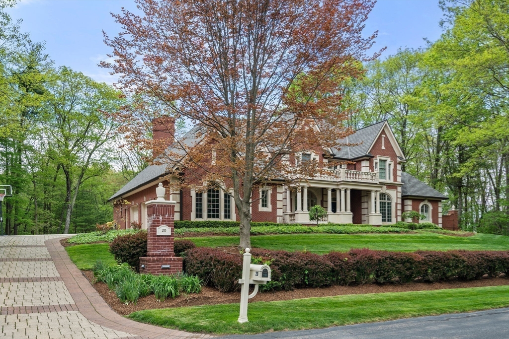 20 Flint Road Concord, MA 01742 - Photo 2 of 34 a front view of a house with a yard