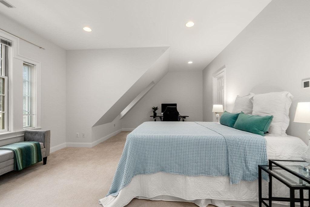 20 Flint Road Concord, MA 01742 - Photo 23 of 34 a bedroom with a bed and a couch