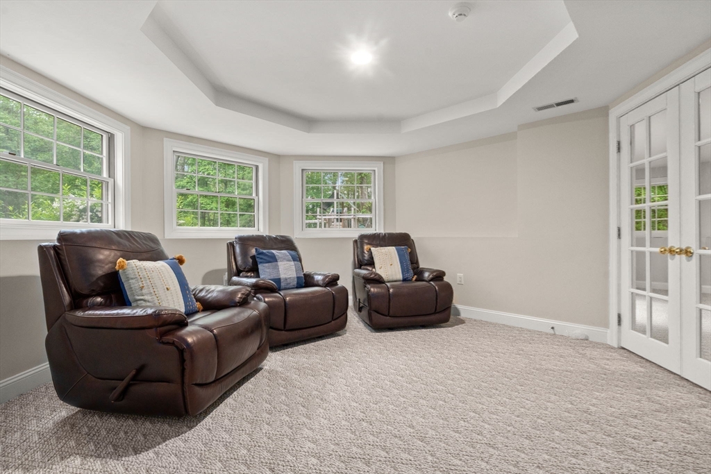 20 Flint Road Concord, MA 01742 - Photo 25 of 34 a living room with furniture and windows