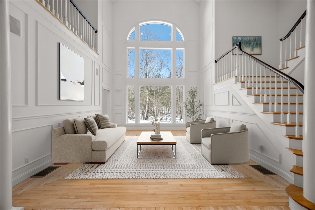 20 Flint Road Concord, MA 01742 - Photo 4 of 34 a living room with furniture and a large window
