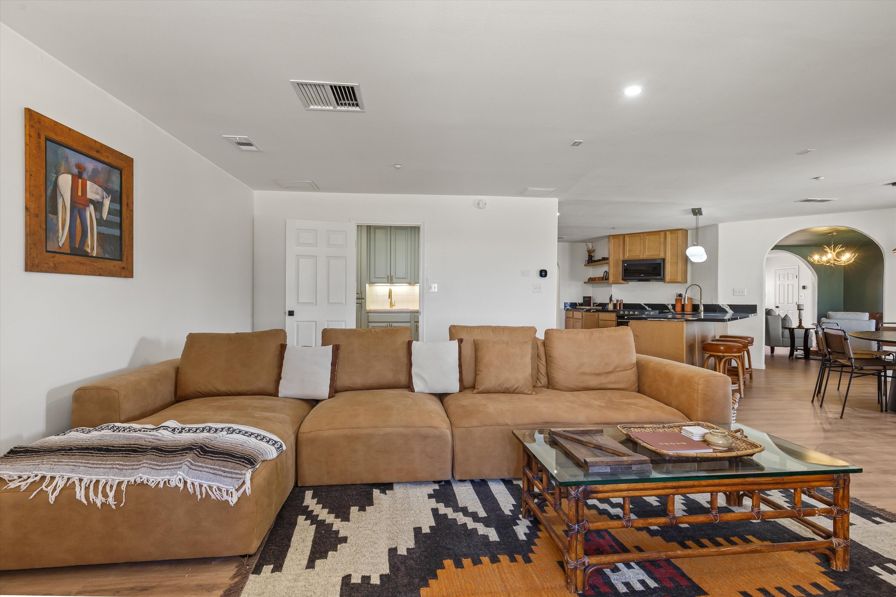 62850 Dennis Avenue Joshua Tree, CA 92252 - Photo 14 of 39 a living room with furniture and wooden floor
