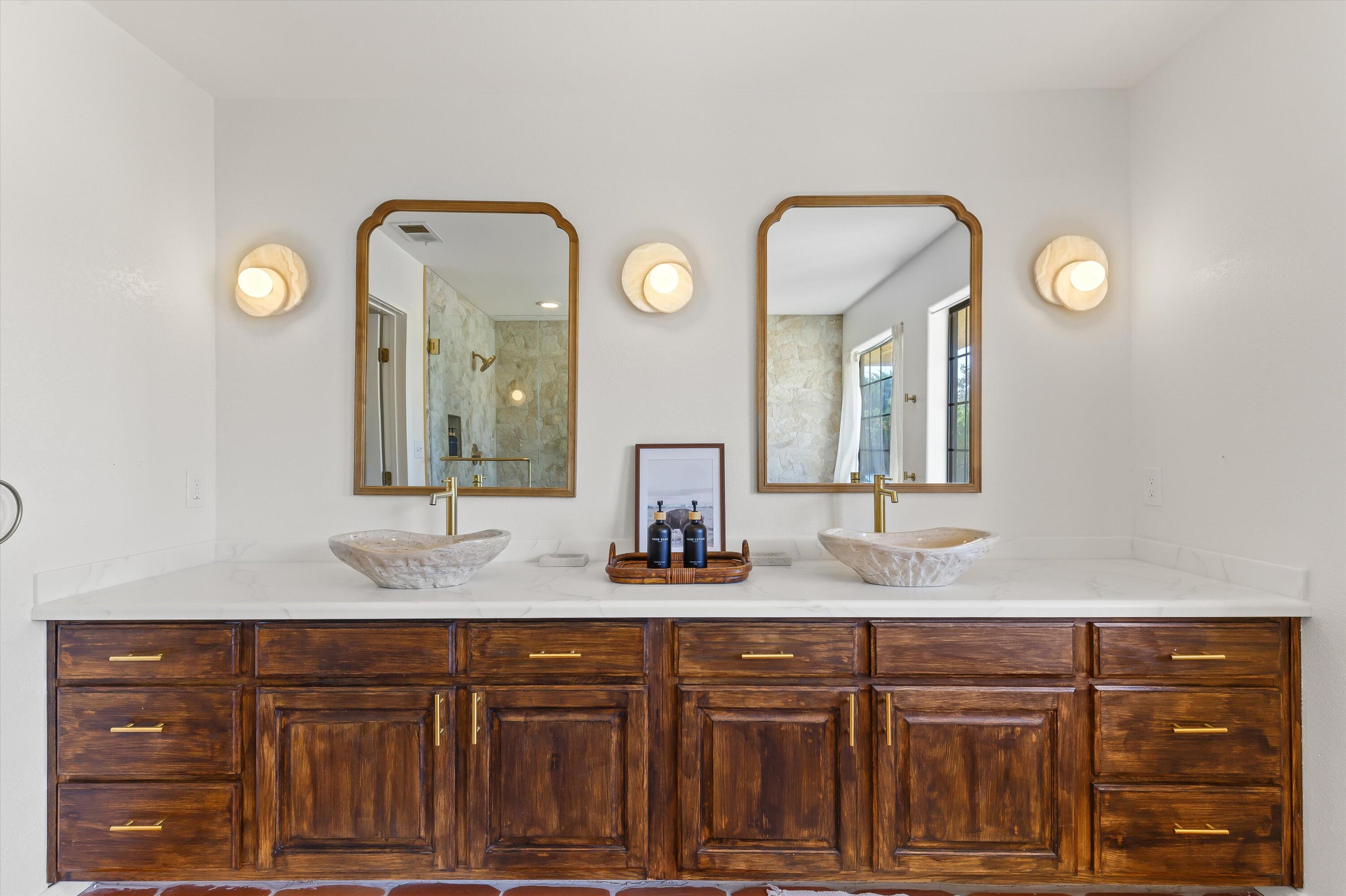 62850 Dennis Avenue Joshua Tree, CA 92252 - Photo 21 of 39 a bathroom with a double vanity sink and a mirror