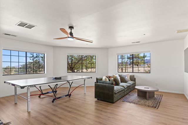 a bathroom with a sink toilet a mirror and shower