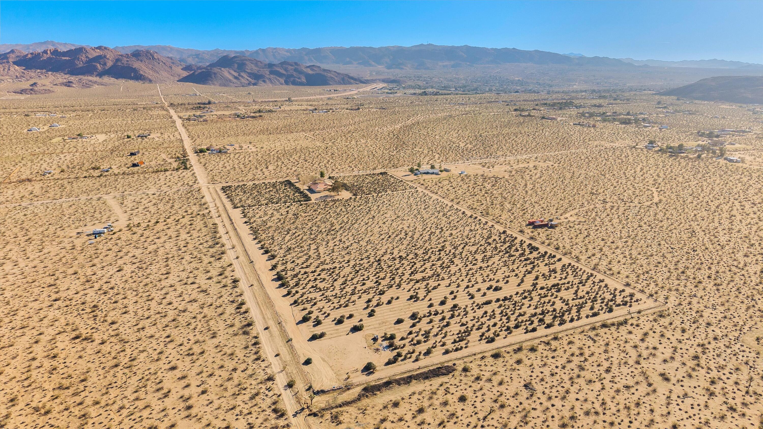 62850 Dennis Avenue Joshua Tree, CA 92252 - Photo 37 of 39 a view of an ocean beach and mountain