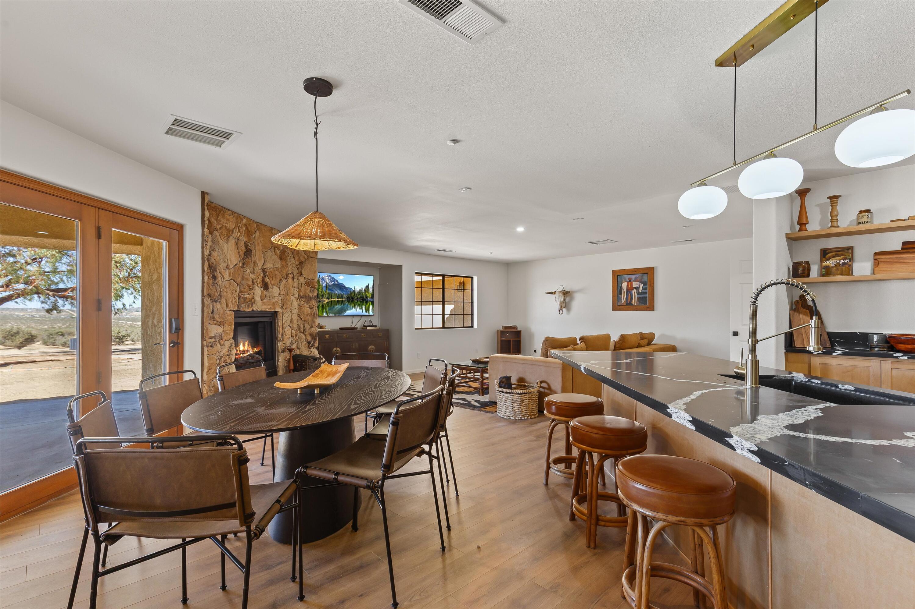 62850 Dennis Avenue Joshua Tree, CA 92252 - Photo 6 of 39 a view of a dining room with furniture window and outside view