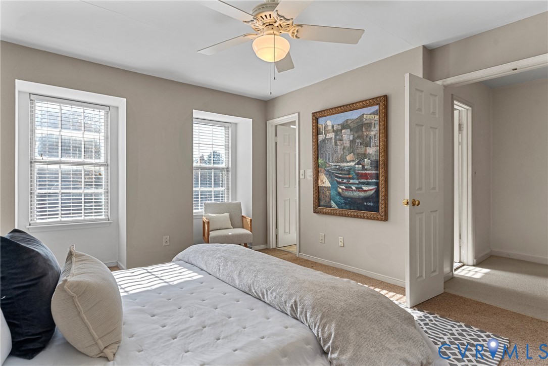 11612 Timberly Waye Henrico, VA 23238 - Photo 15 of 37 a bedroom with a bed and a window