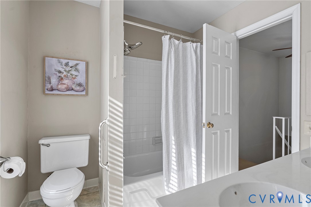 11612 Timberly Waye Henrico, VA 23238 - Photo 16 of 37 a white toilet sitting next to a bathroom sink