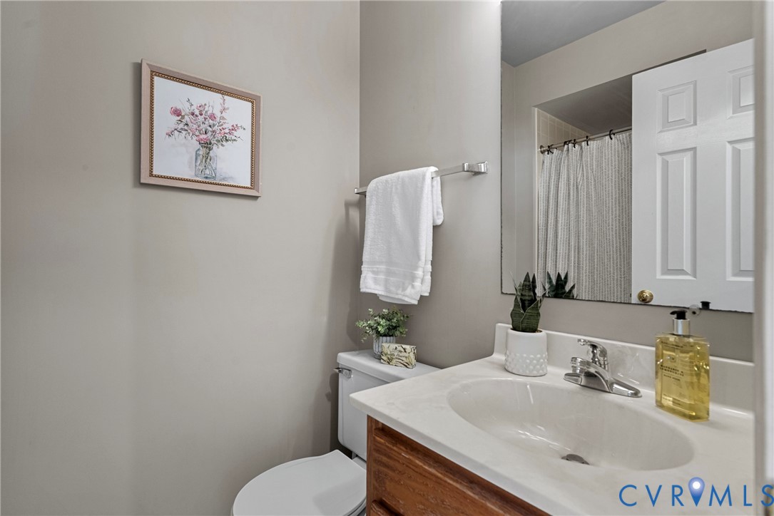 11612 Timberly Waye Henrico, VA 23238 - Photo 22 of 37 a bathroom with a sink vanity and toilet