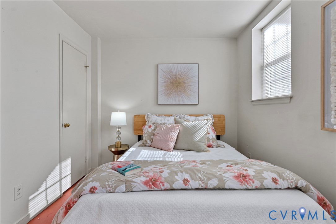 11612 Timberly Waye Henrico, VA 23238 - Photo 24 of 37 a bedroom with a bed and a window