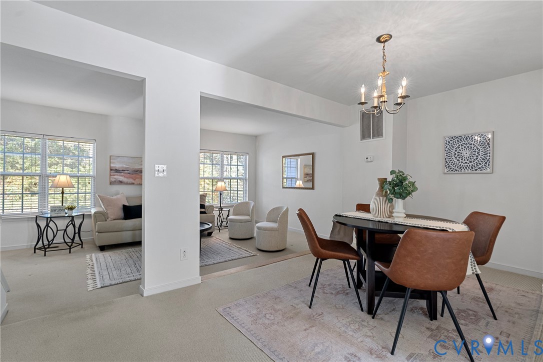 11612 Timberly Waye Henrico, VA 23238 - Photo 4 of 37 a view of a dining room with furniture window and wooden floor