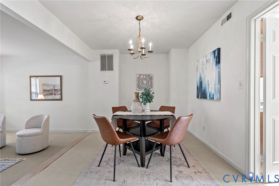 11612 Timberly Waye Henrico, VA 23238 - Photo 5 of 37 a dining room with furniture and window