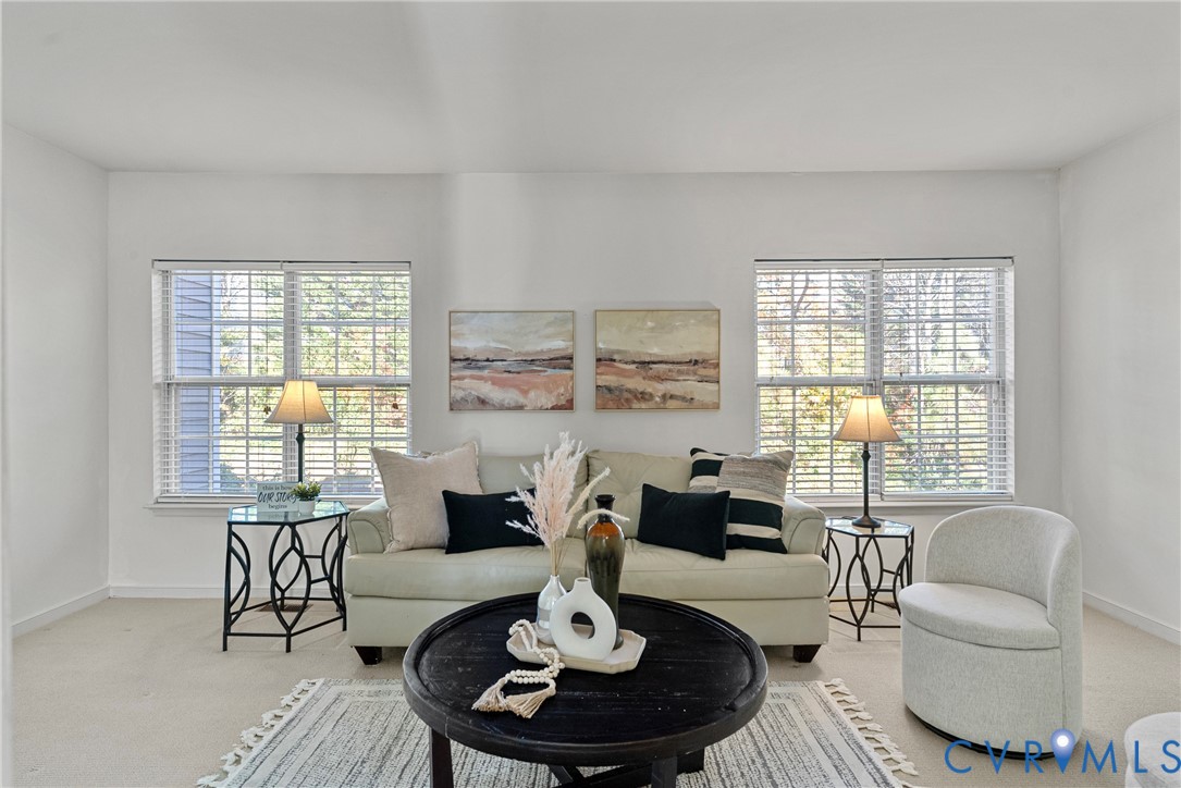 11612 Timberly Waye Henrico, VA 23238 - Photo 7 of 37 a living room with fireplace furniture and a large window