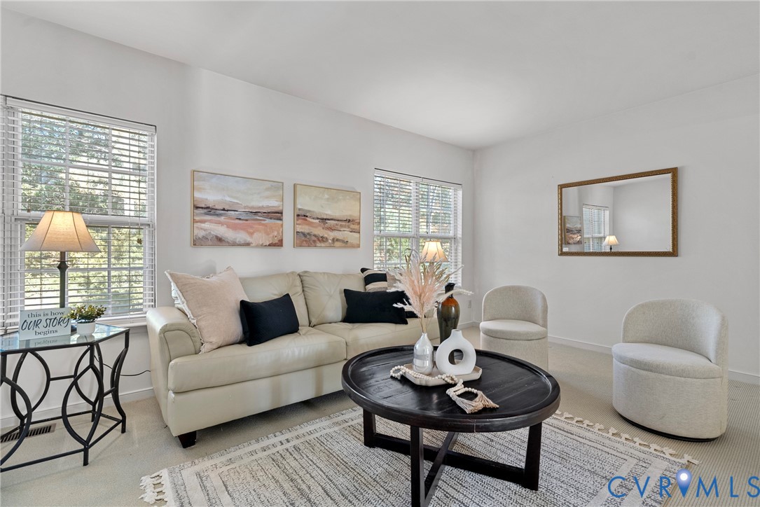 11612 Timberly Waye Henrico, VA 23238 - Photo 8 of 37 a living room with furniture and a potted plant