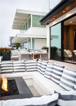 a living room with fireplace furniture and a flat screen tv