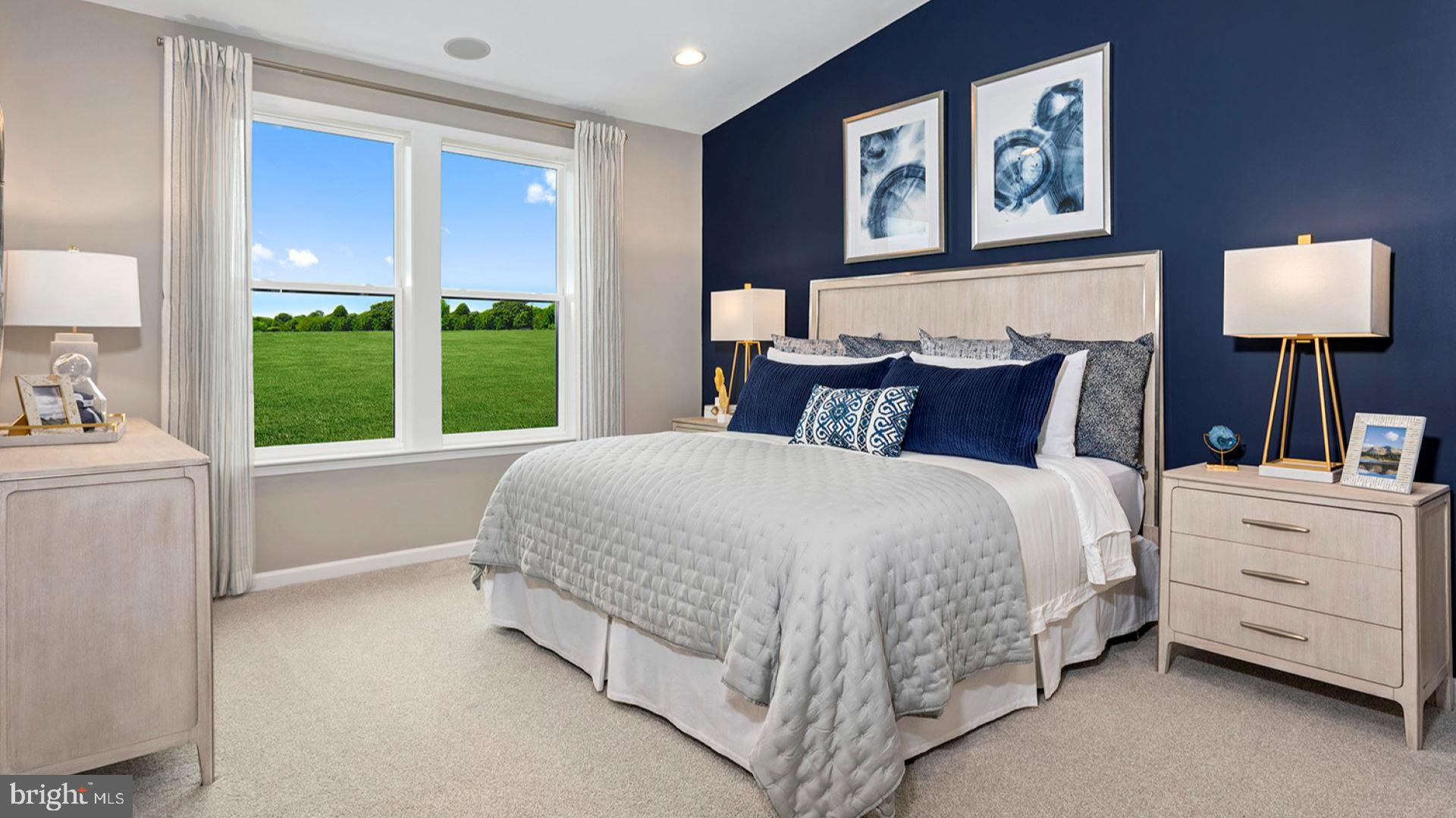 2006 Peace Lily Lane Frederick, MD 21702 - Photo 6 of 16 a bedroom with a large bed and a window