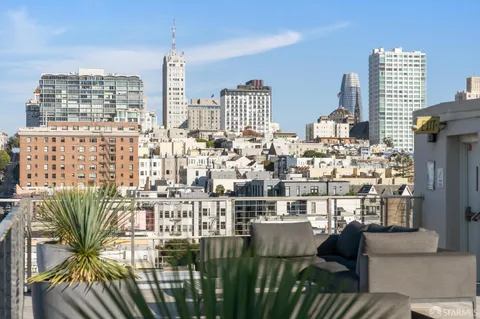 a view of city with tall buildings