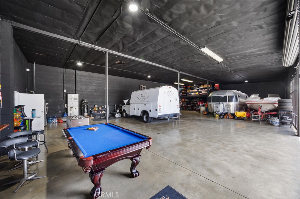 14128 Paramount Boulevard Paramount, CA 90723 - Photo 12 of 42 a view of garage with furniture